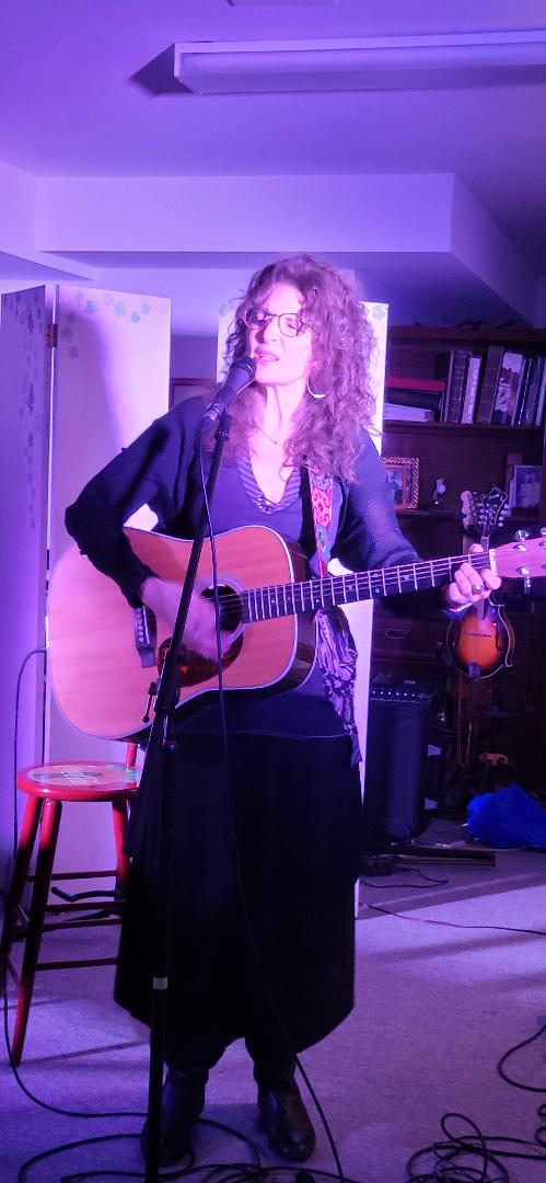 Laurie Kerr singing on Songwriter Stage